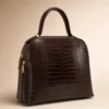 7e15f09a6d8b51f992dbab42f192c230aa0d2af197e8e46463697ac3cad4ca06 Tas NOA Brown van leer met croco-patroon – Gemaakt in Italië